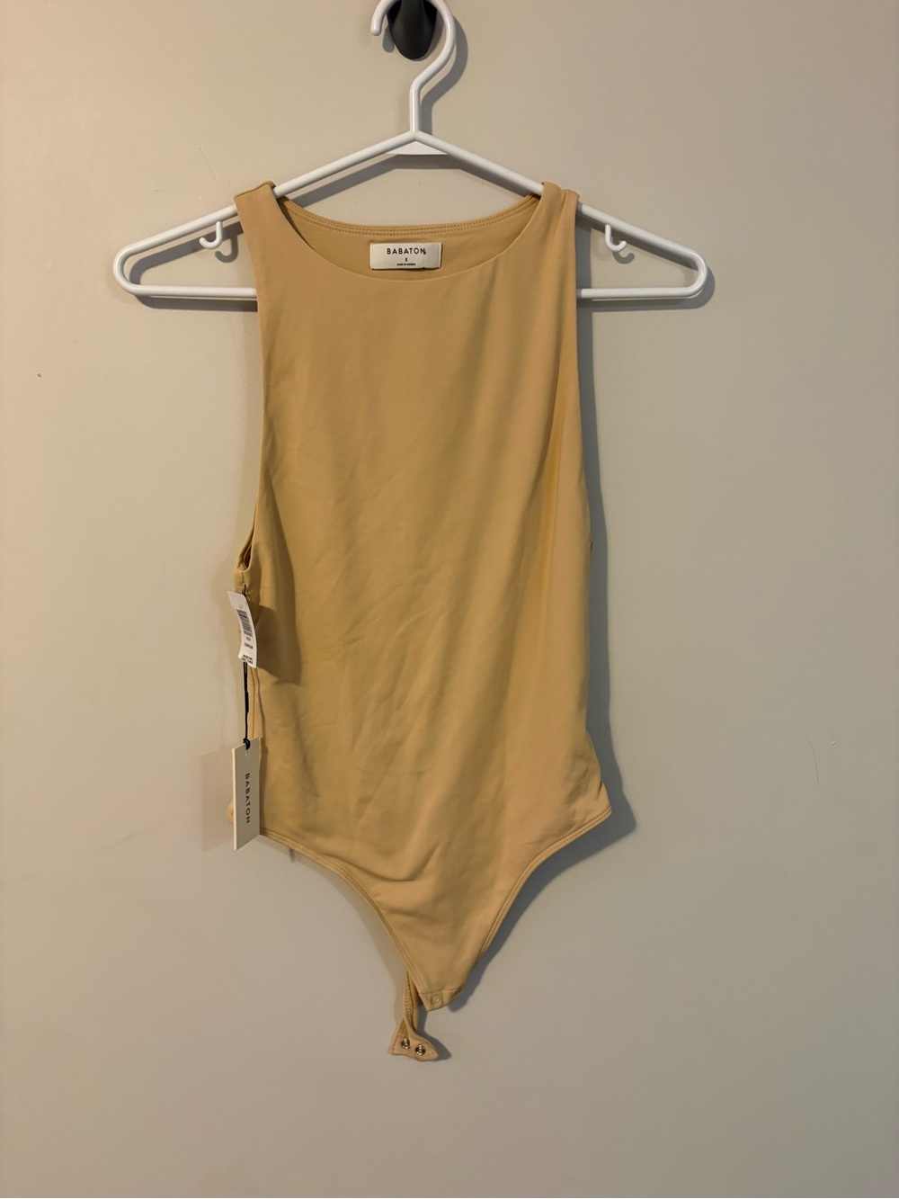 NWT Babaton Contour High-Neck Bodysuit in a tan